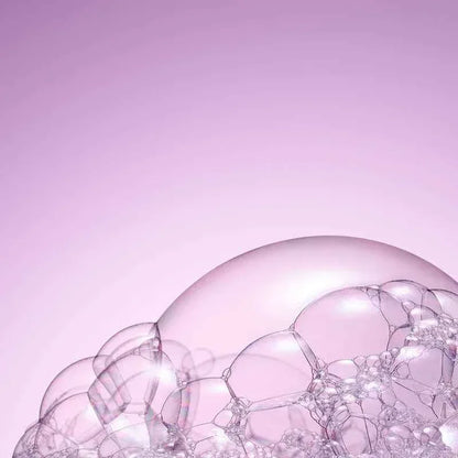 Bulles de savon translucides sur fond rose pâle | La Para Du Lac